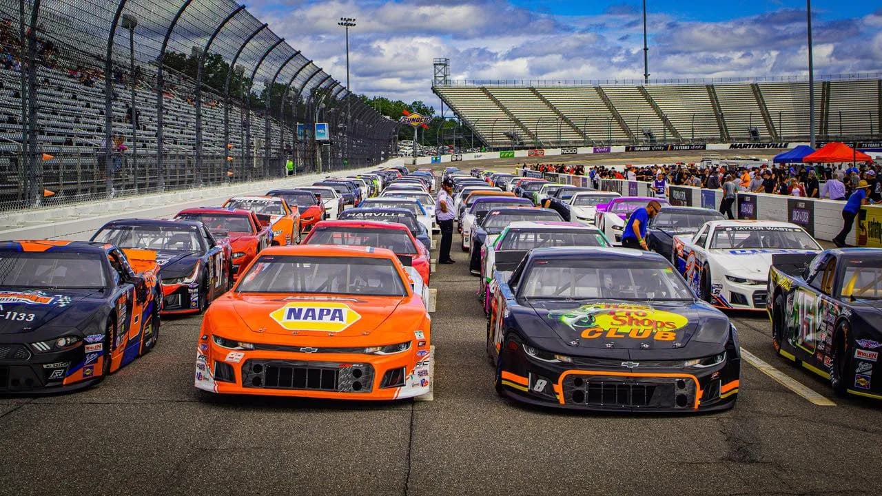 Stock car field at speed